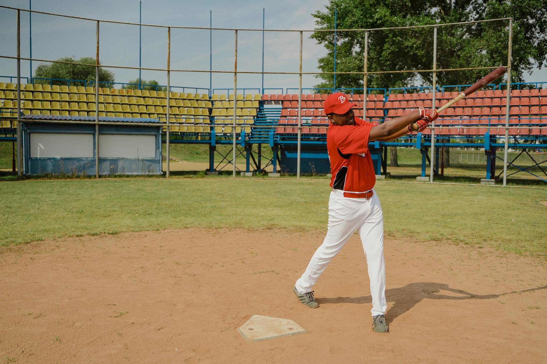 baseball player with gear bag