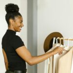 woman organizing fall wardrobe